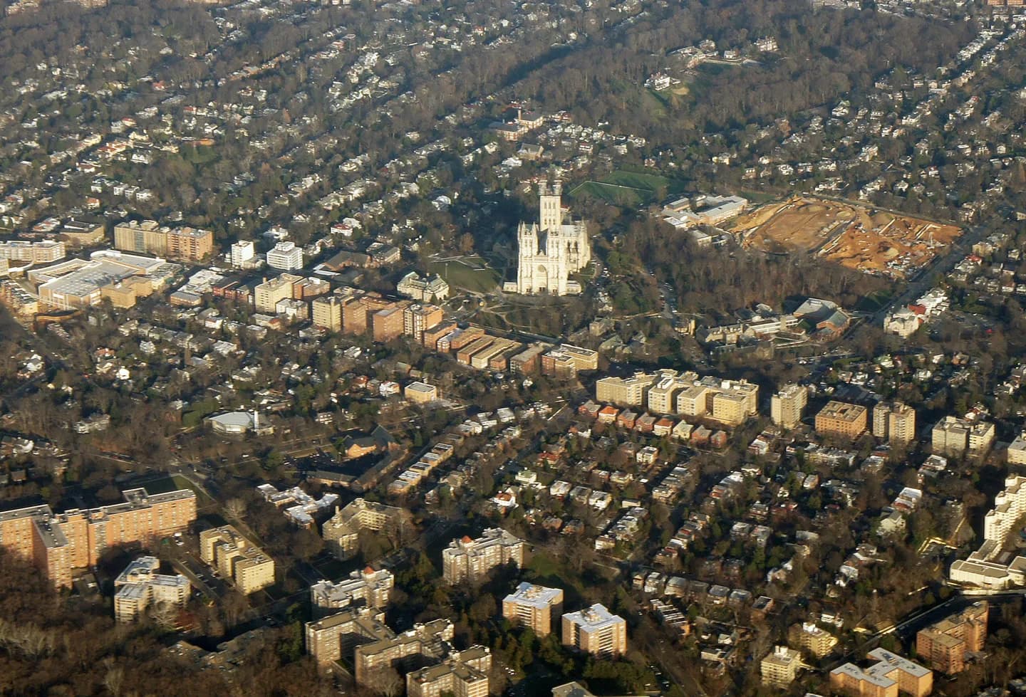 Aerial view Cathedral Heights, Wisconsin Ave NW. The Washington National Cathedral is shown in the middle of the image. Washington, D.C.