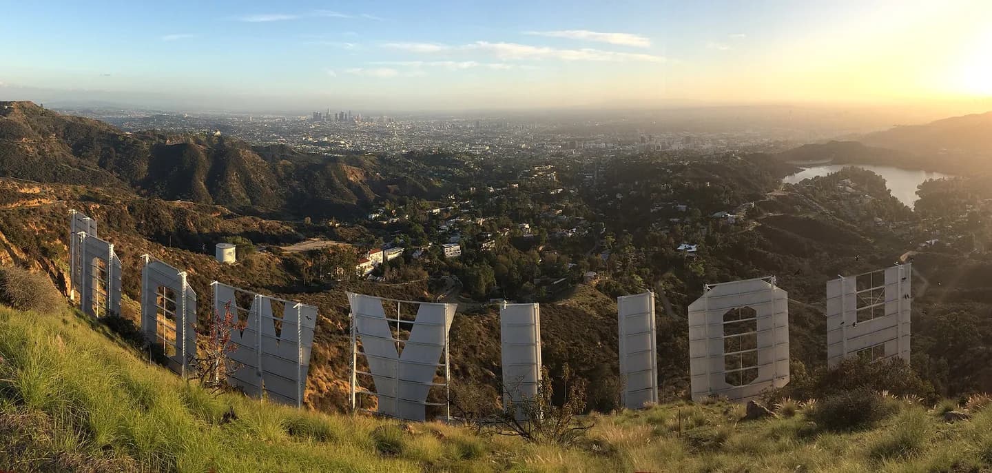 Taken from atop Mt. Lee showing the back of the Hollywood Sign. From left to right, the view includes the Griffith Observatory, downtown Los Angeles, Hollywoodland subdivision (near/below), the sprawl of Los Angeles, Lake Hollywood. Taken o